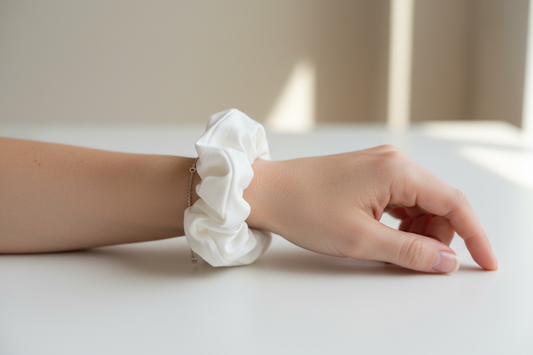 white scrunchie on wrist